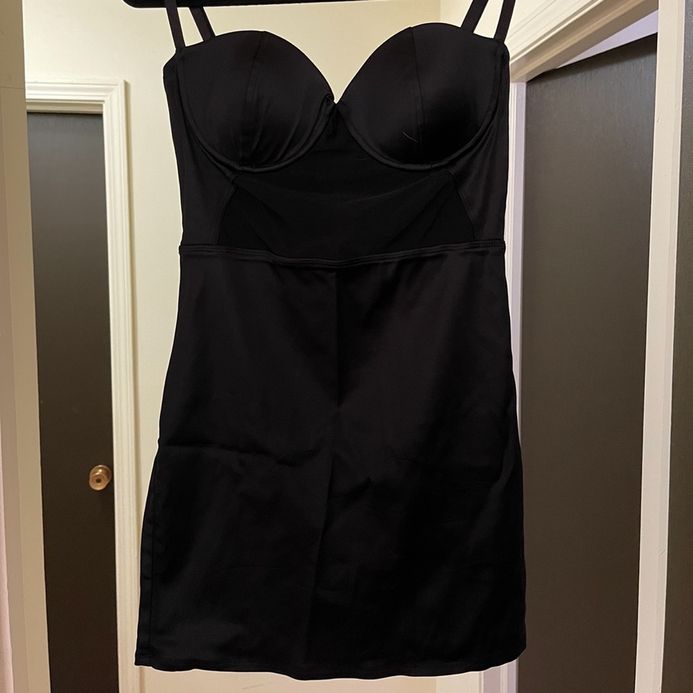 Short black dress with a mesh center on front of the dress